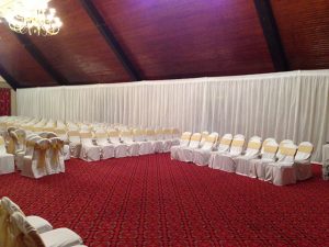 White Pleated Drapes